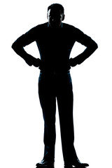 silhouette man full length angry hands on hips
