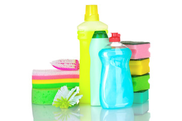 detergent bottles, brushes and sponges isolated on white