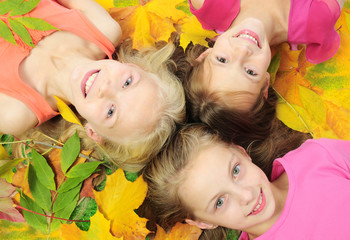 Children in autumn leaves