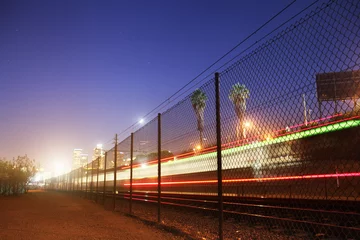 Zelfklevend Fotobehang Blurred train at Los Angeles at night © logoboom