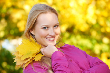 Woman at autumn outdoors