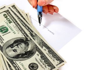 Money and document in female hand.