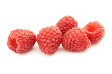 Raspberries on white background