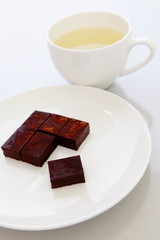 chocolate and a cup of green tea