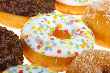 White donuts with confetti