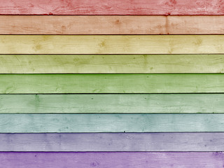Rainbow coloured planks of wood