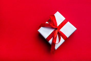 Small gift with red ribbon