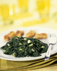 Epinards en branches et nuggets de poisson