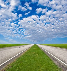 asphalt road leaving far