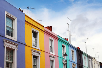 Fototapeta na wymiar Notting Hill houses in the famous Portobello Road market.