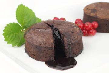 Chocolate soufflé cake on white background