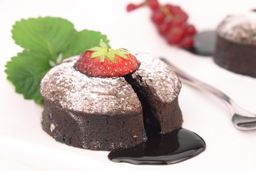Chocolate soufflé cake on white background