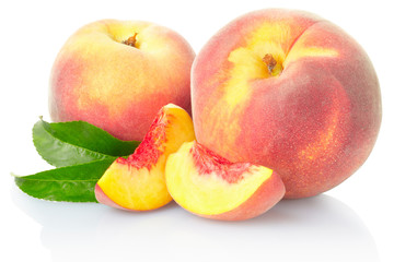 Naklejka na ściany i meble Peach fruits with leaves on white with clipping path