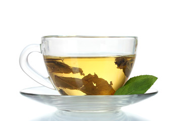 green tea in transparent cup and mint isolated on white