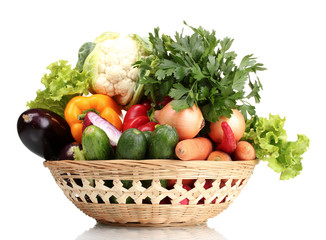 Fresh vegetables in basket isolated on white
