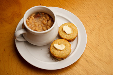 Cupcake style buttered cornbread with bean soup