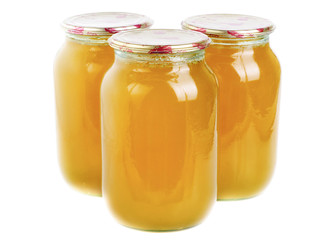 honey in glass jar isolated