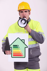 craftsman holding an energy consumption label and a megaphone