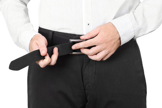 closeup of man in classic style dress wear belt isolated
