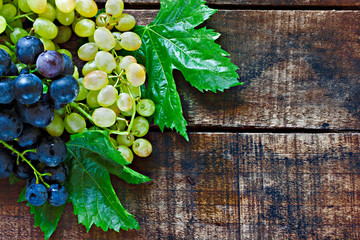 Assortment of grapes on a rustic wooden table