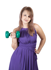 Young woman with barbell