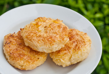 whole rice made into balls and baked