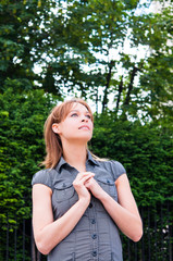 beautiful young attractive woman outdoors portrait of thinking w
