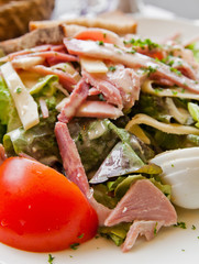 Fresh fruits salad and ham with egg