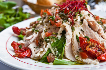 Fresh chicken salad with tomatoes