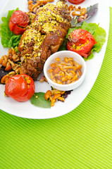 Lamb leg served in the plate