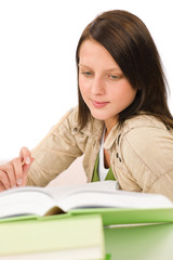 Student teenager girl write homework with book