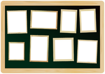 blank vintage picture frames, attached on a blackboard