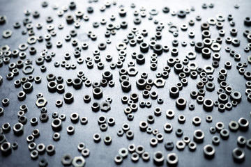 Abstract metal nuts background
