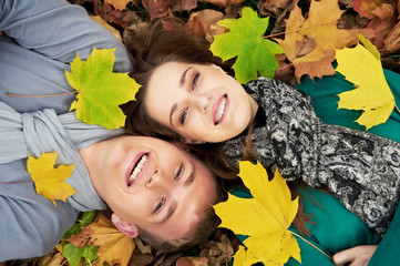 Young couple at autumn outdoors