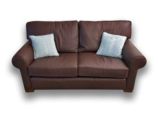 Brown leather sofa with cushions