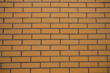 Yellow brick wall - obrazy, fototapety, plakaty