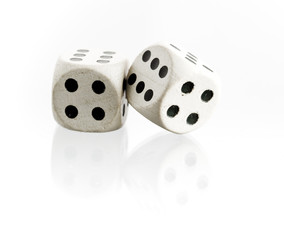 Two dice with reflection