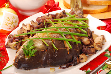 carp baked with mushrooms and onion for christmas