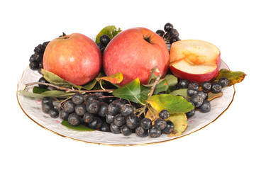 Mountain ash and apples on a plate