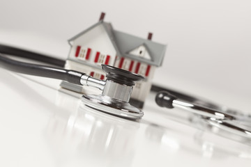 Stethoscope with Small Model Home