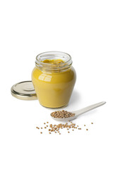 Mustard in a jar and mustard seeds