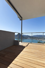 Modern apartment, balcony, lake panoramic view