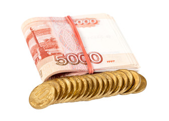 Russian rubles banknotes and coins over white