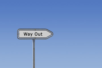 Way out sign on signpost