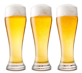 Beer into glass isolated on white. three options
