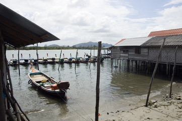 Fishing houses and boats in Koh Lanta, Thailand
