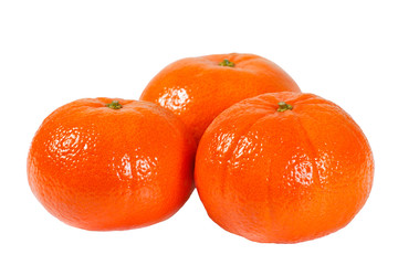 Three fresh juicy orange tangerine