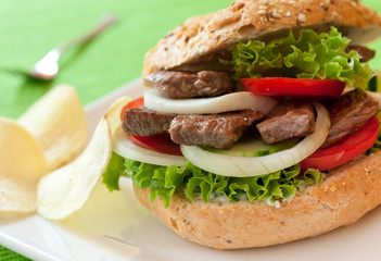 Sandwich with beef and vegetables