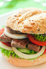 Sandwich with beef and vegetables