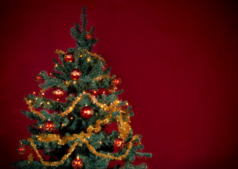 Christmas tree on red background